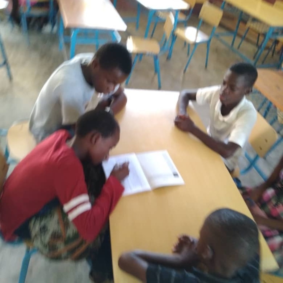 A group of people sitting at a table