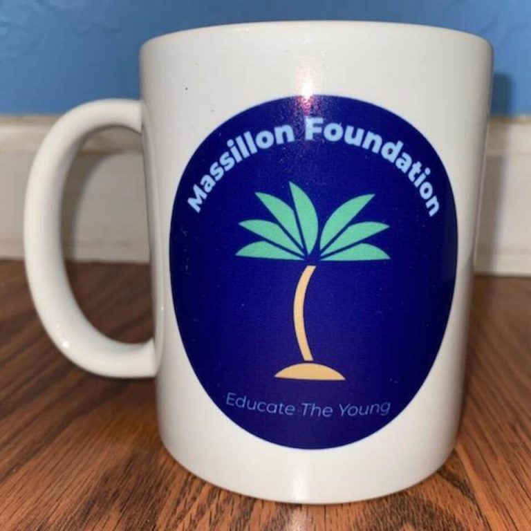 A coffee mug with the logo of massillon foundation.