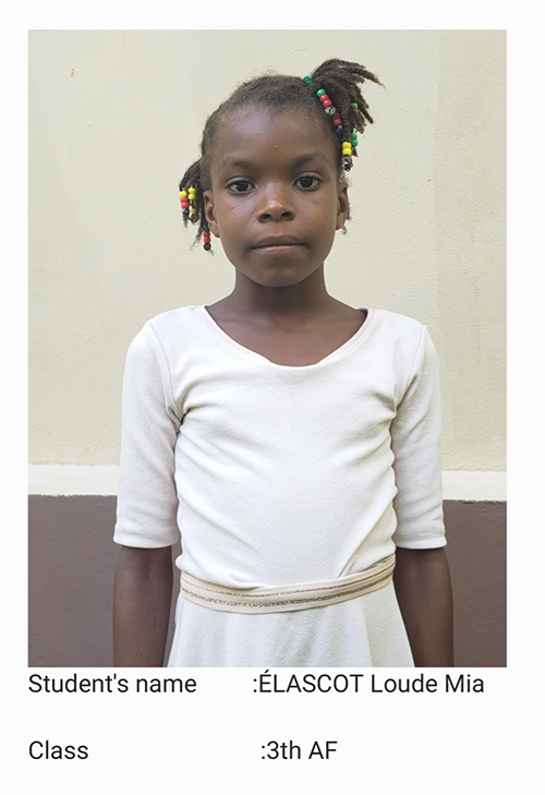 A young girl in white dress with braids.