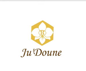 Ju'Doune logo with orchid in a hexagon.