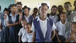 Group of students in school uniforms.